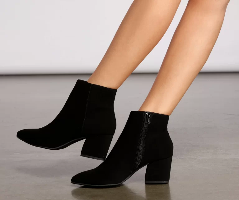 Step Out with Style in Black Heeled Boots for Women